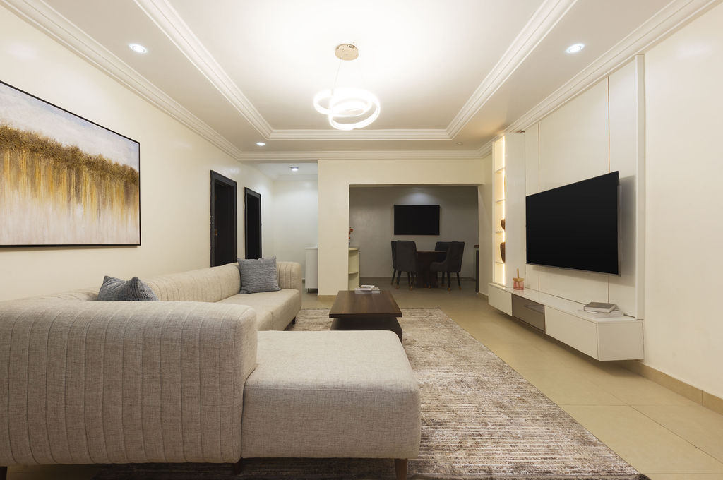 Capital Apartments Deluxe one bedroom siting room.jpg